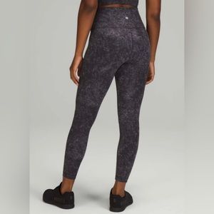 Lululemon Wunder Train High-Rise Tight 25", Size 12
Color: Lavendar Black